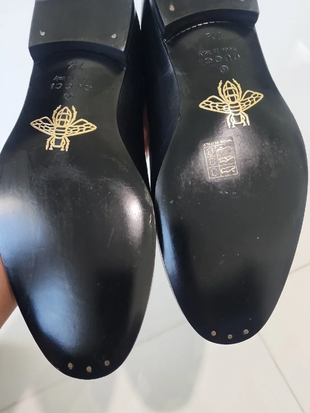Gucci Black Leather Tassel Loafers with Gold Cat Accent